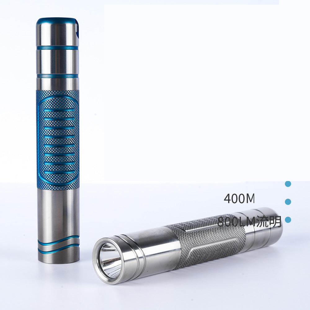Titanium alloy ultra-bright flashlight with magnetic charging and secure magnetic attachment, designed for rugged durability and versatile hands-free illumination-1